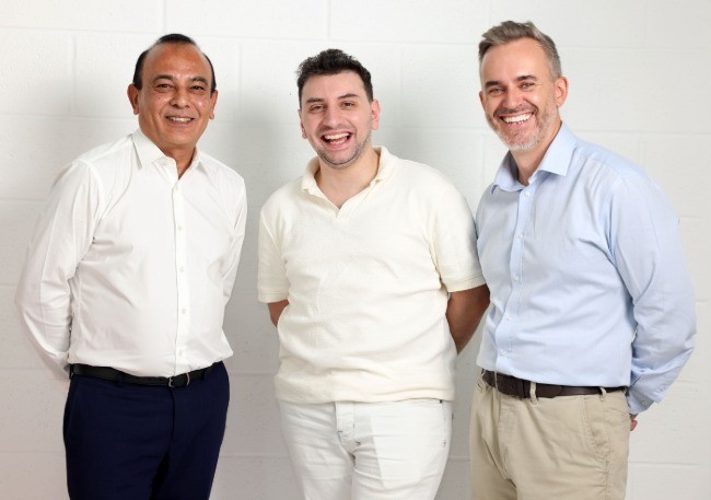 Vijay Vaghela, Ahmad Haffar and Mark Thompson at Gulf News